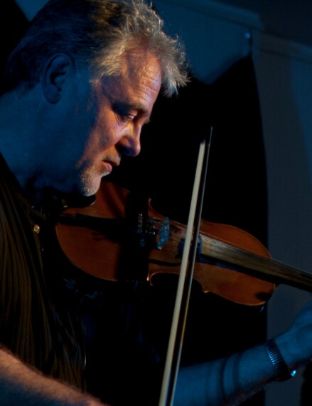 Author playing violin