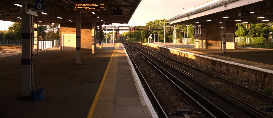 Station Empty platforms, trains lines leading away